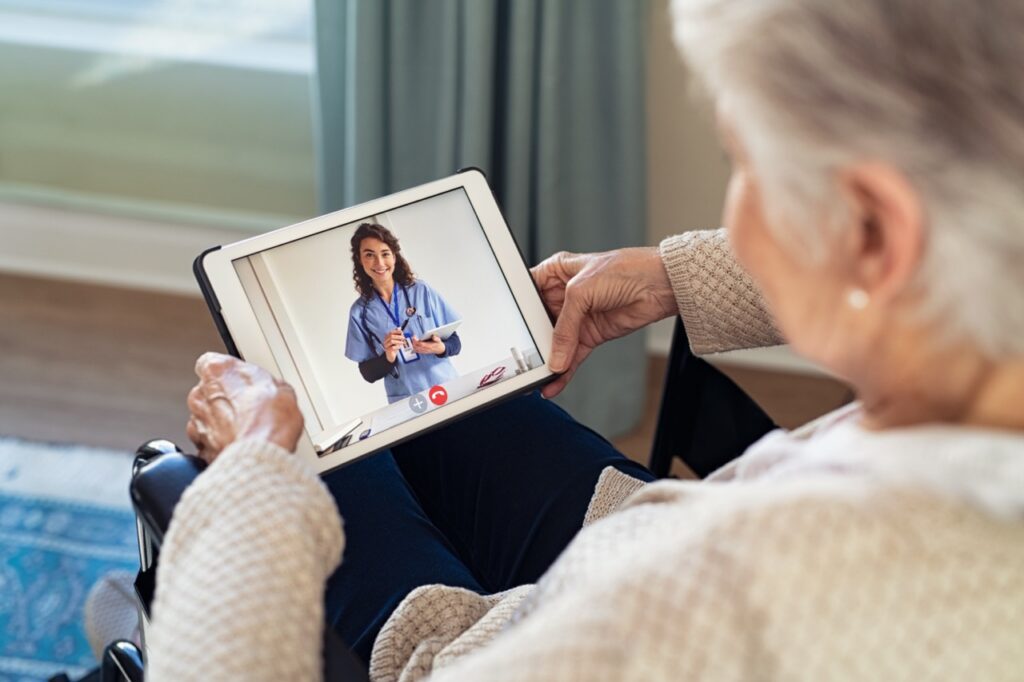 Patient using closed captioning during an accessible telehealth video visit