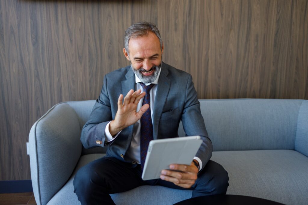 Executive joining a discreet telehealth visit as part of an executive health program